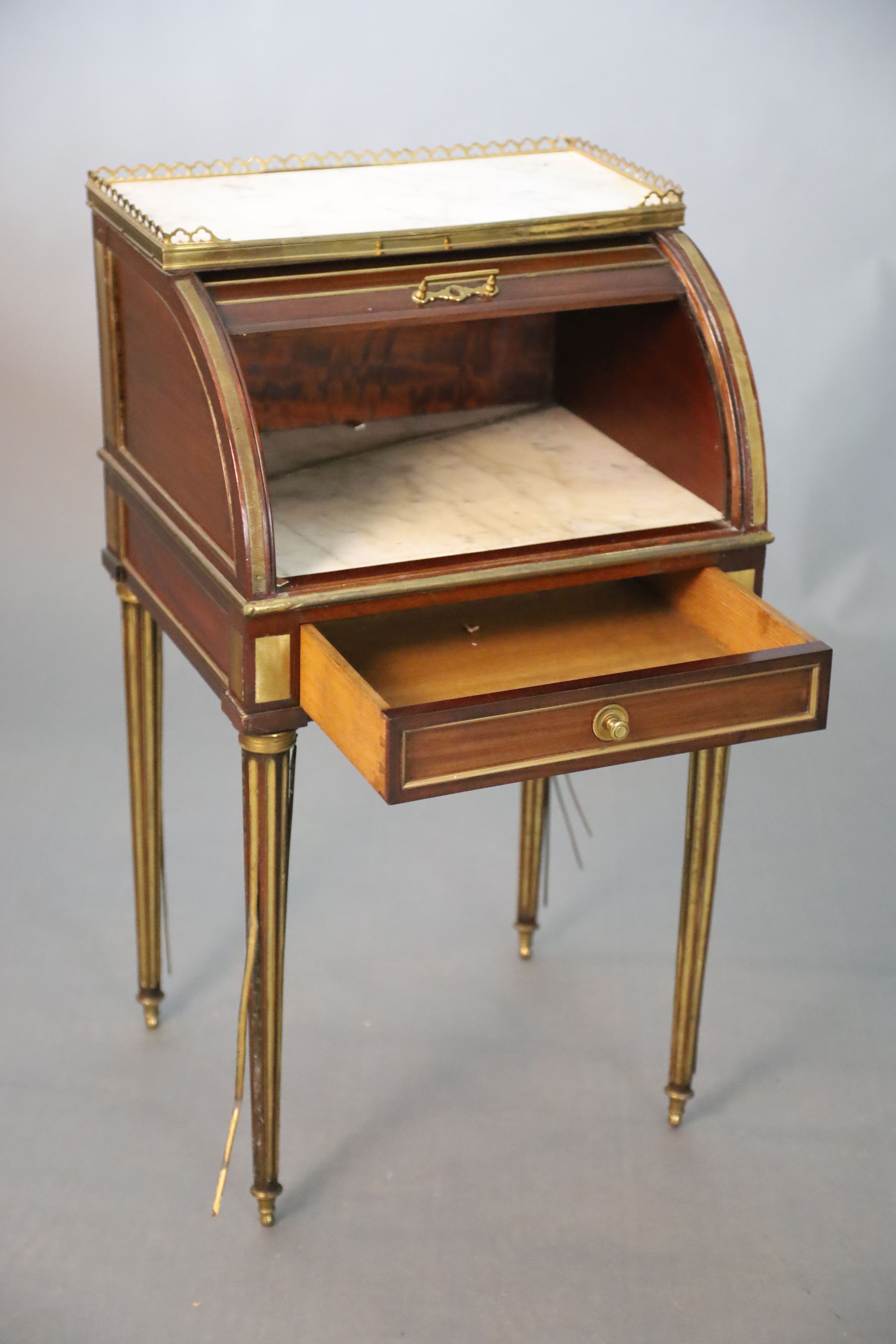 A childs 19th century French gilt metal mounted mahogany cylinder front bureau, W.43.5cm D.38cm H.79cm